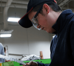 student wears safety glasses during work.