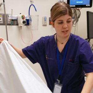 Project SEARCH student makes hospital bed.